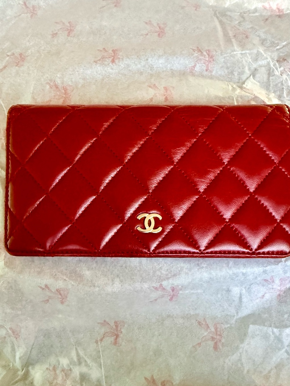Authentic CHANEL Quilted Red Lambskin Leather Long Wallet with Silver CC Emblem.